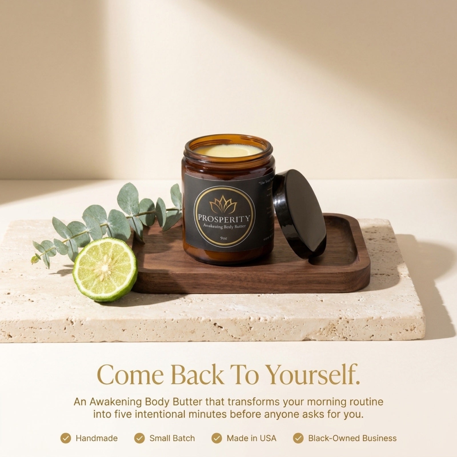 Come Back To Yourself — Prosperity Butter™ 9oz on a wooden tray with bergamot and eucalyptus